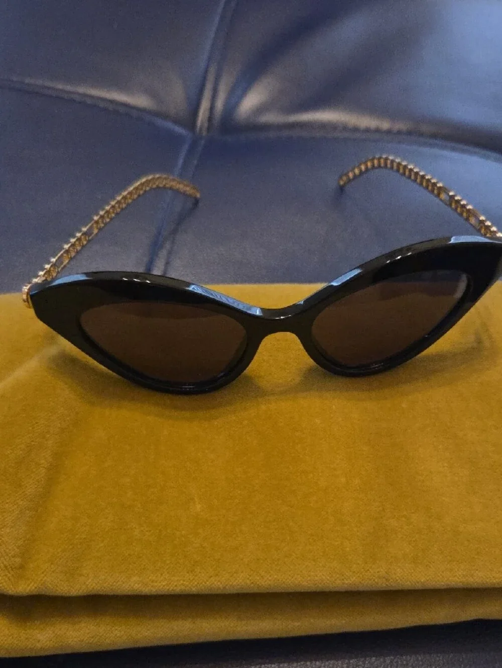 Gucci Black Cat-Eye Sunglasses with Gold Hardware